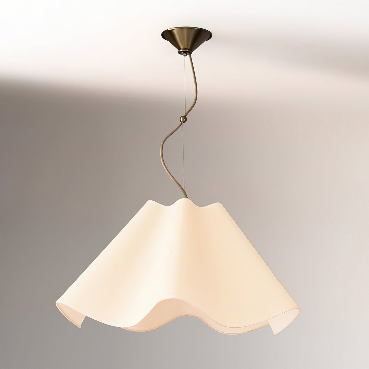 Pendant light with a white lampshade on a neutral background